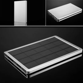 O painel solar 5000mah do banco portátil do poder jejua carregando para o iPhone, iPad mini